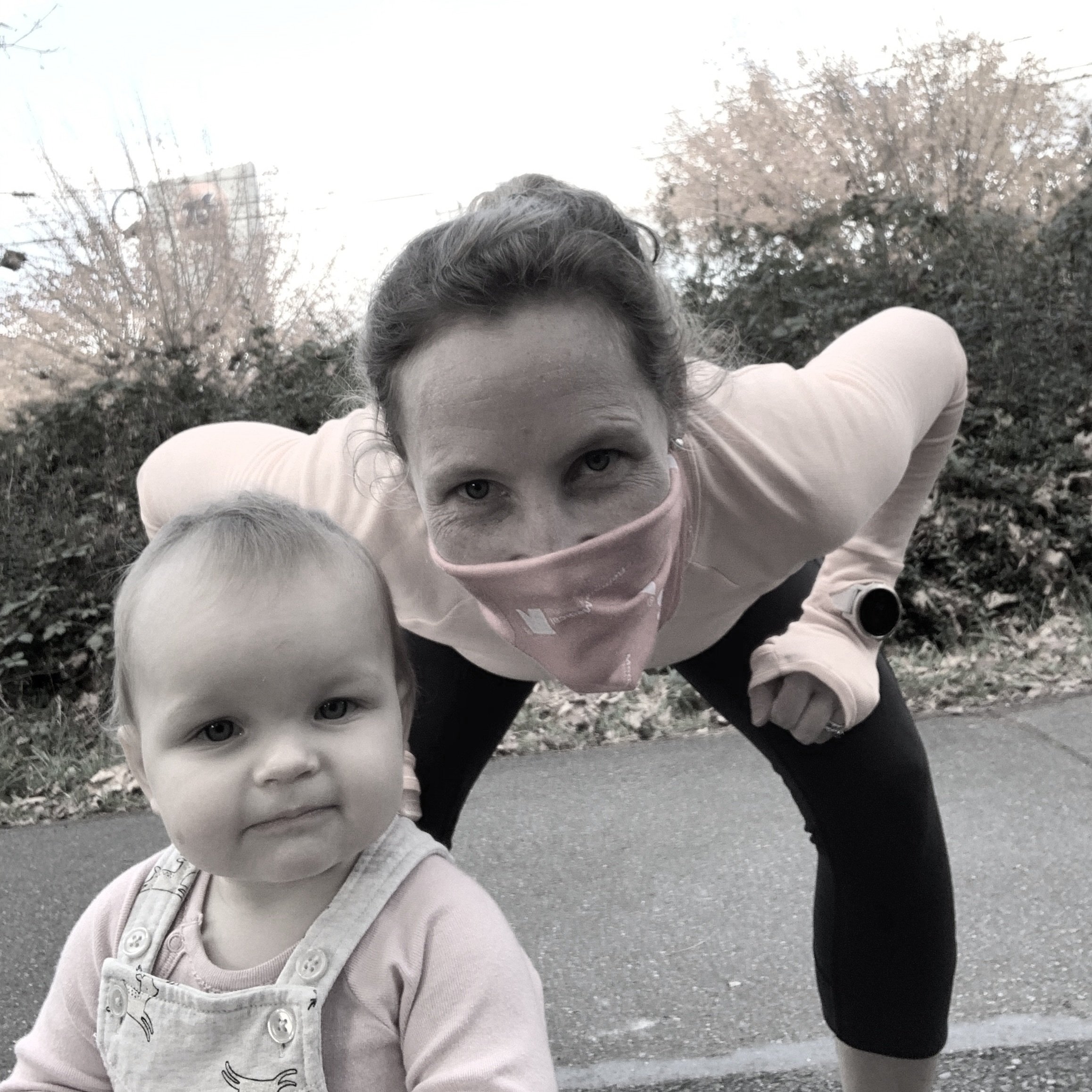 Mom and daughter smiling post run